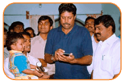 Mr. N Bitra, Friends & Family, With Mr. Kapil Dev & Sri PNV Prasad, Ex. SAAP Chairman, The occasion of Kinetic Boss Vehicle Opening at Bitra's House At Banjara Hills, Road No. 10, On 21st Oct'2002.